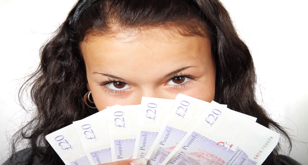woman holding money